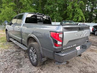 2023 Nissan TITAN XD Crew Cab Platinum Reserve 4x4 - Exterior Rear Left Corner Image